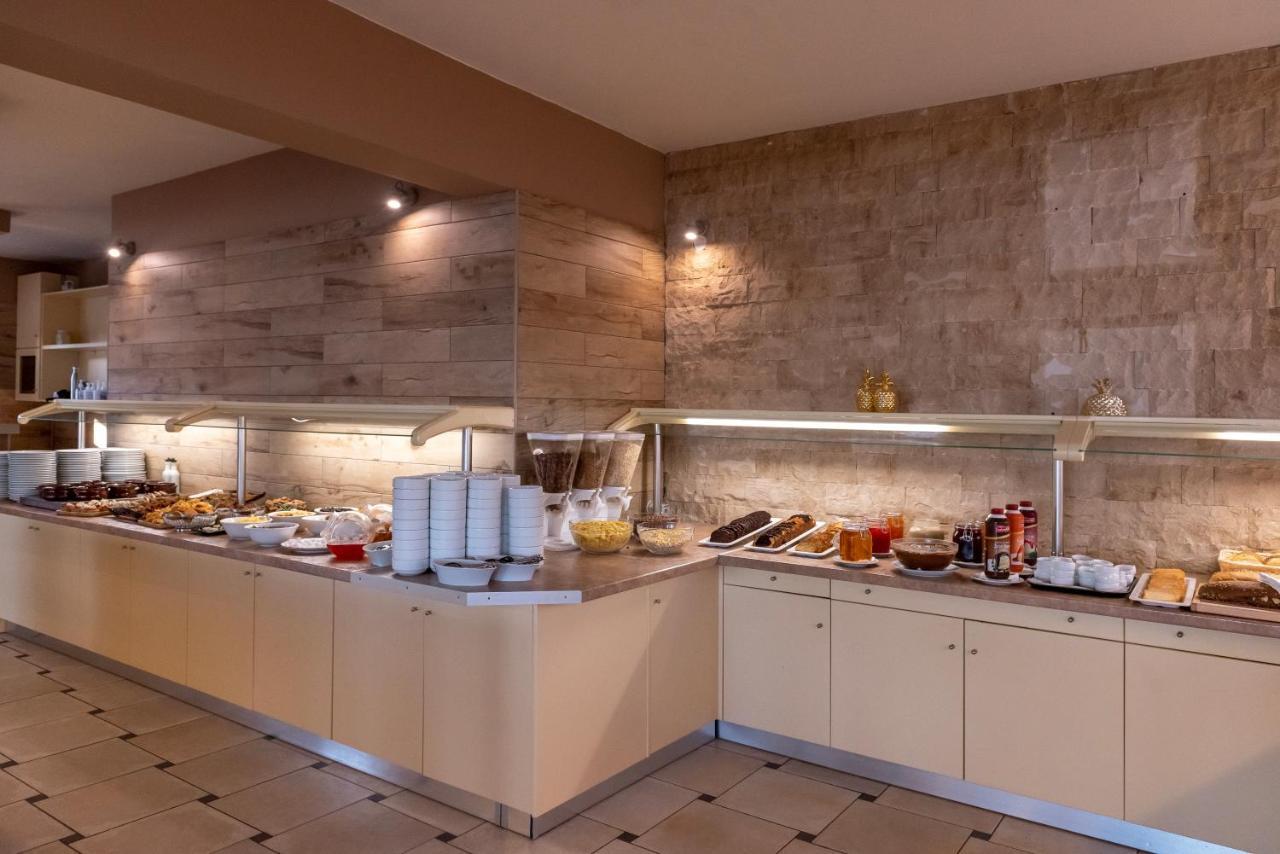 Eurohotel Theo Hotel Агия-Марина Экстерьер фото
